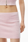 Alexander Wang light pink logo embossed miniskirt in chenille