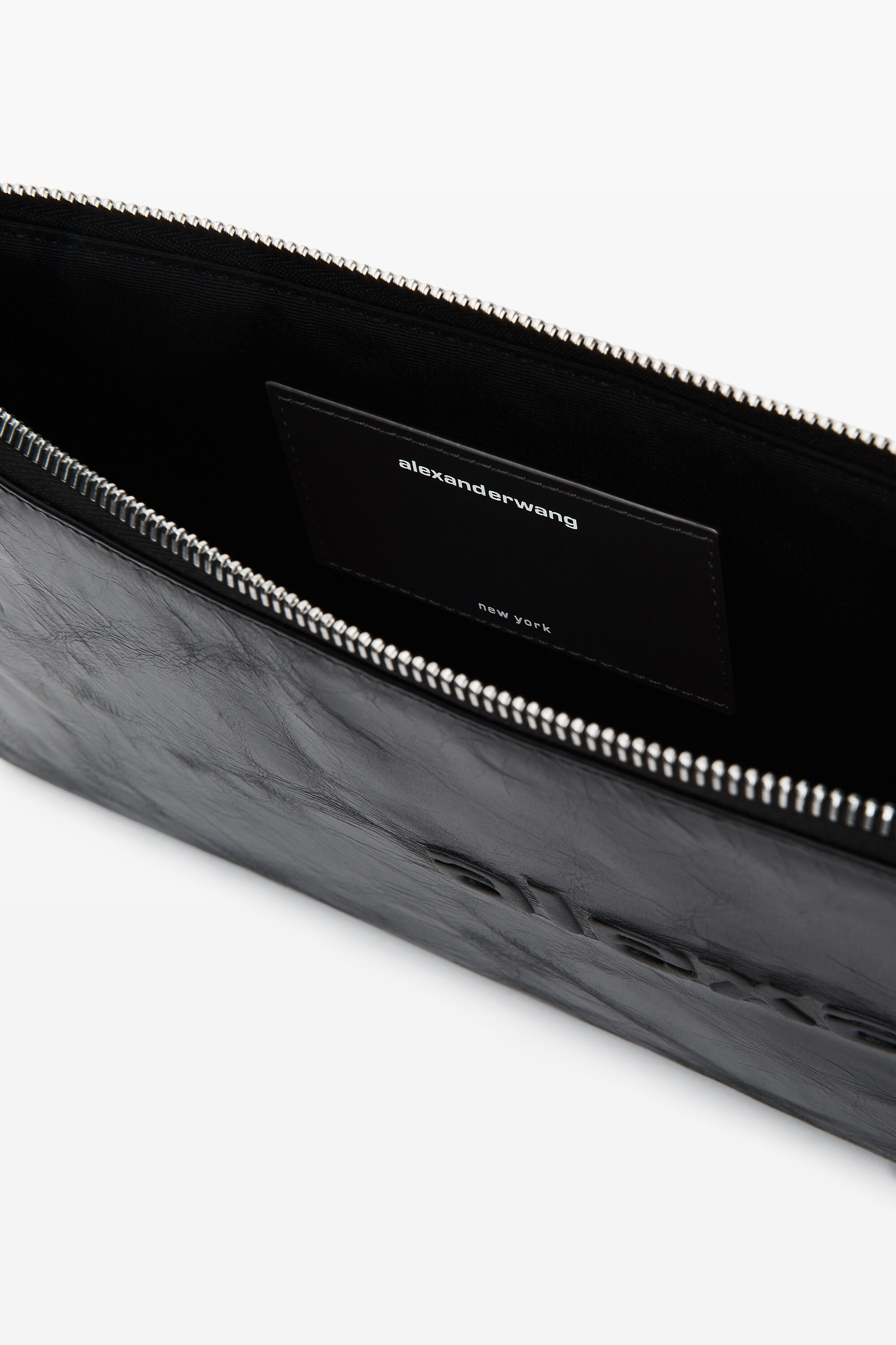 punch zip pouch in crackle patent leather in BLACK | alexanderwang®
