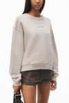 Alexander Wang washed oyster baumwollfrottee-sweatshirt mit geprägtem klingenlogo