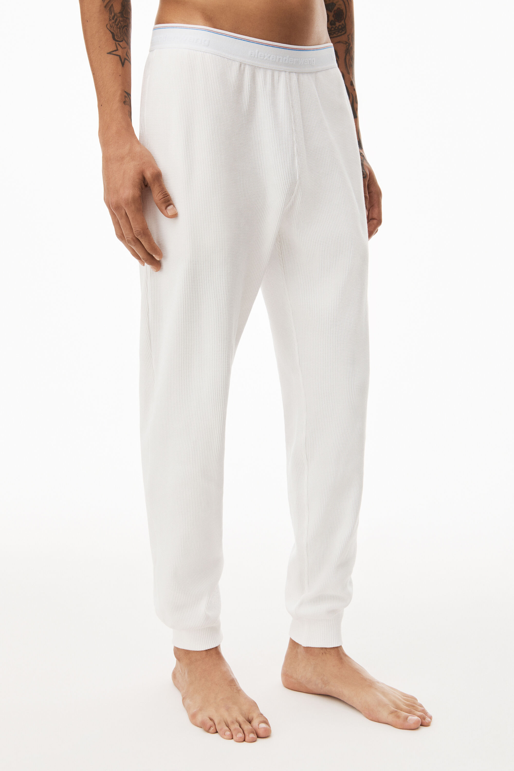 UNISEX JOGGER IN COTTON WAFFLE THERMAL in WHITE br ul class product details accordion list li class product details accordion list item slash pockets in lined jersey alexanderwang